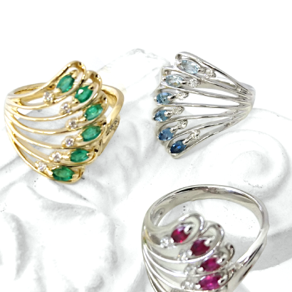 カラーグラデーションが美しい羽根モチーフリング