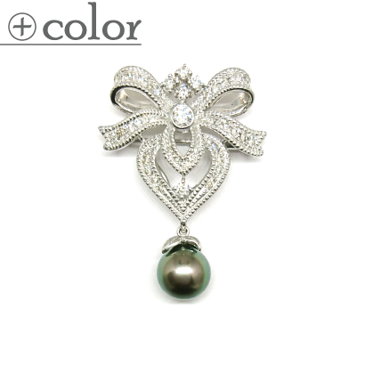 ダイヤのゴージャスリボンにパールが揺れるブローチ